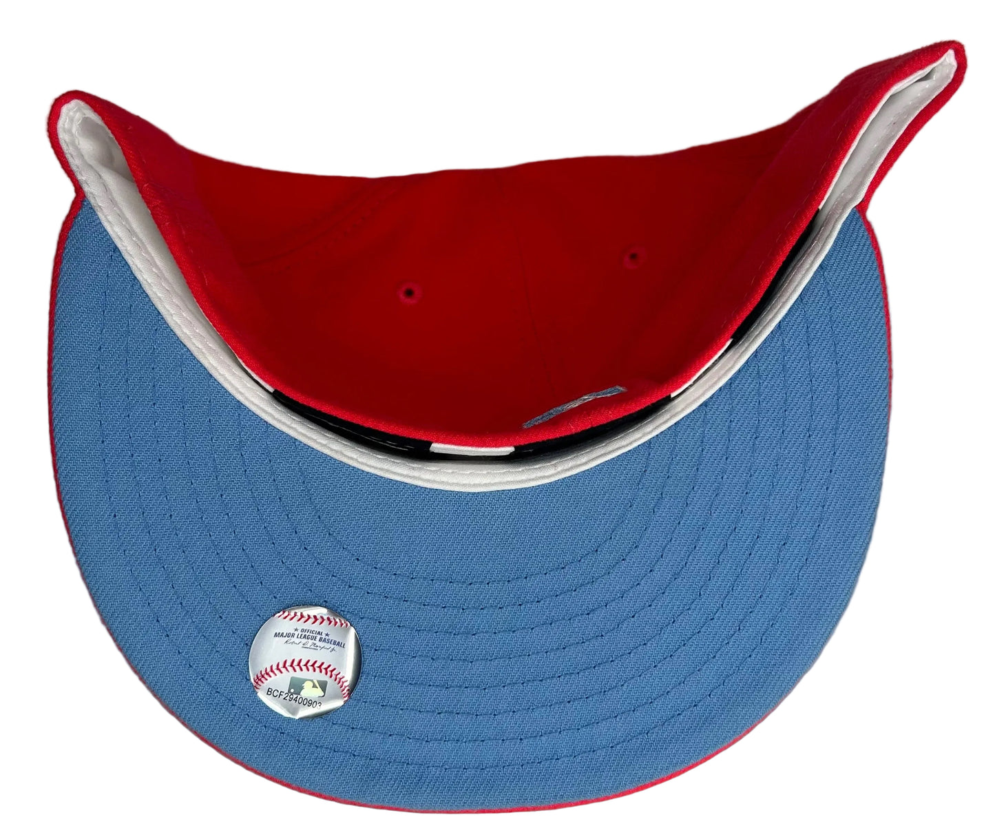 This New Era New York Yankees Subway Series 2000 Red fitted hat features a blue undervisor.
