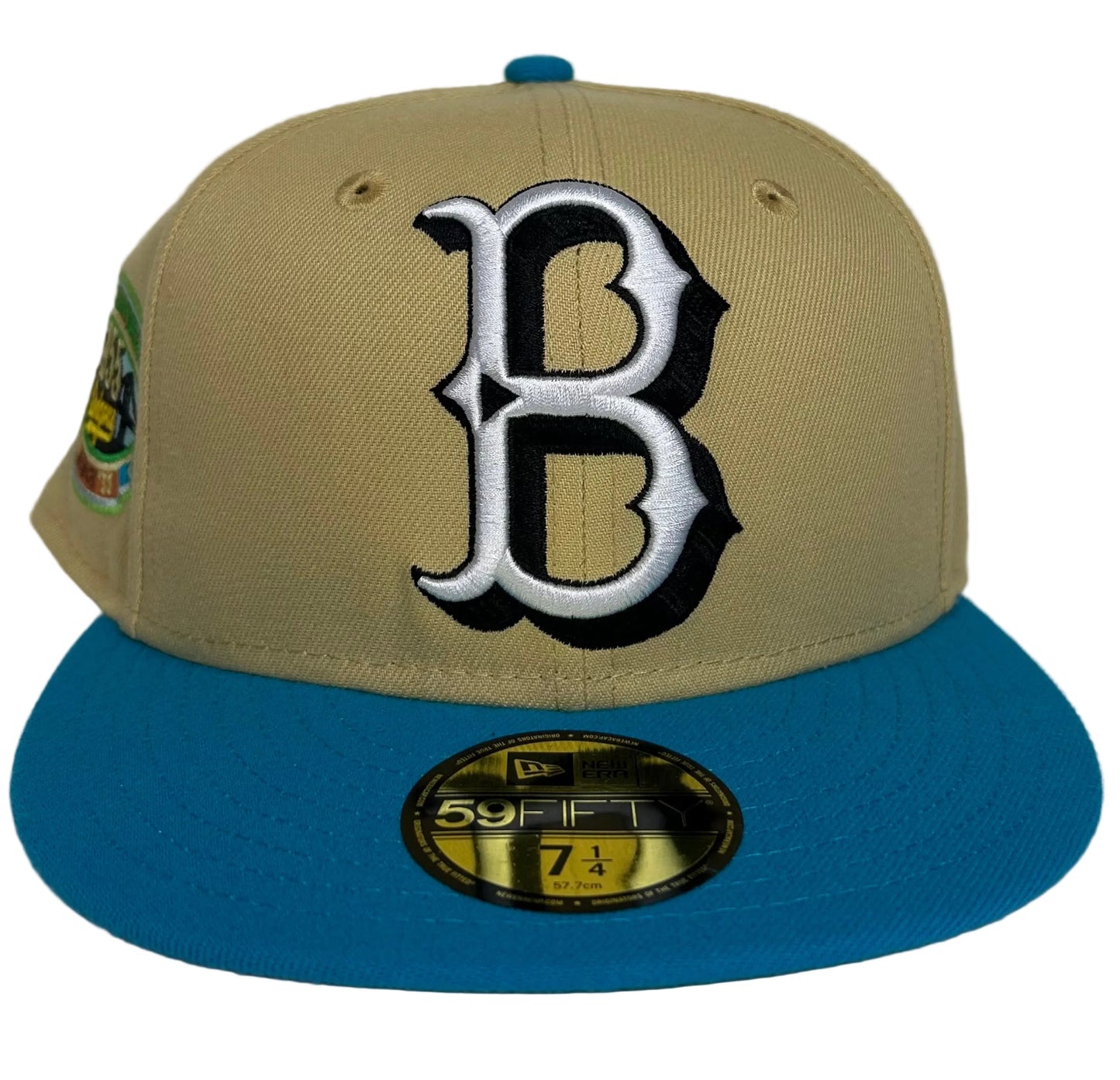 New Era Brooklyn Dodgers 59FIFTY fitted hat, featuring a Vegas Gold crown, Royal Blue visor, and a special Jackie Robinson anniversary side patch.