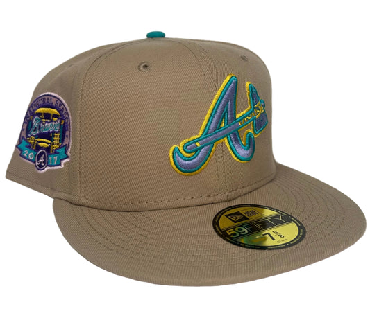 New Era Atlanta Braves 59FIFTY fitted hats from the Sandstorm Collection, featuring a tan colorway, a specialized side patch, and a vibrant pink under visor.