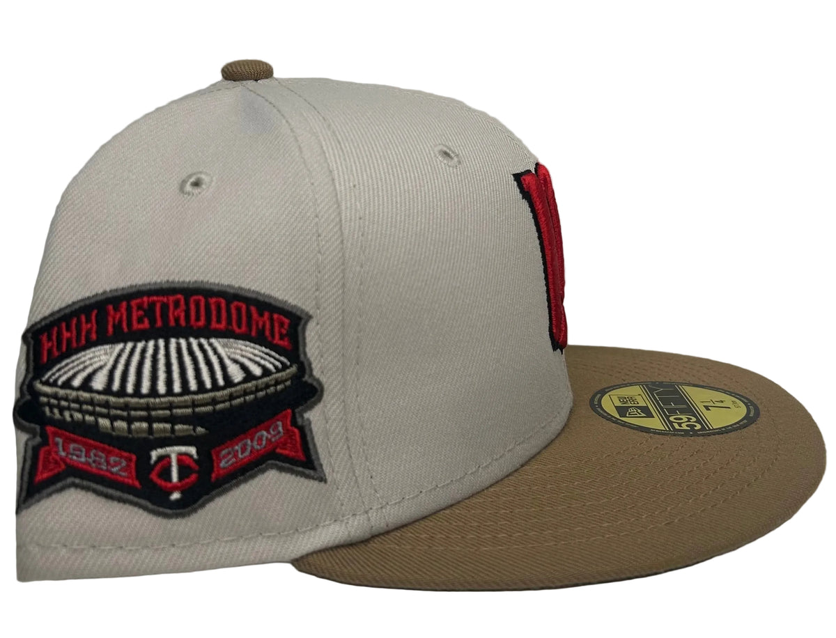 Minnesota Twins New Era 59FIFTY fitted hat features an off-white/grey crown, a tan flat brim, and a Hubert H. Humphrey Metrodome 1982–2009 side patch.
