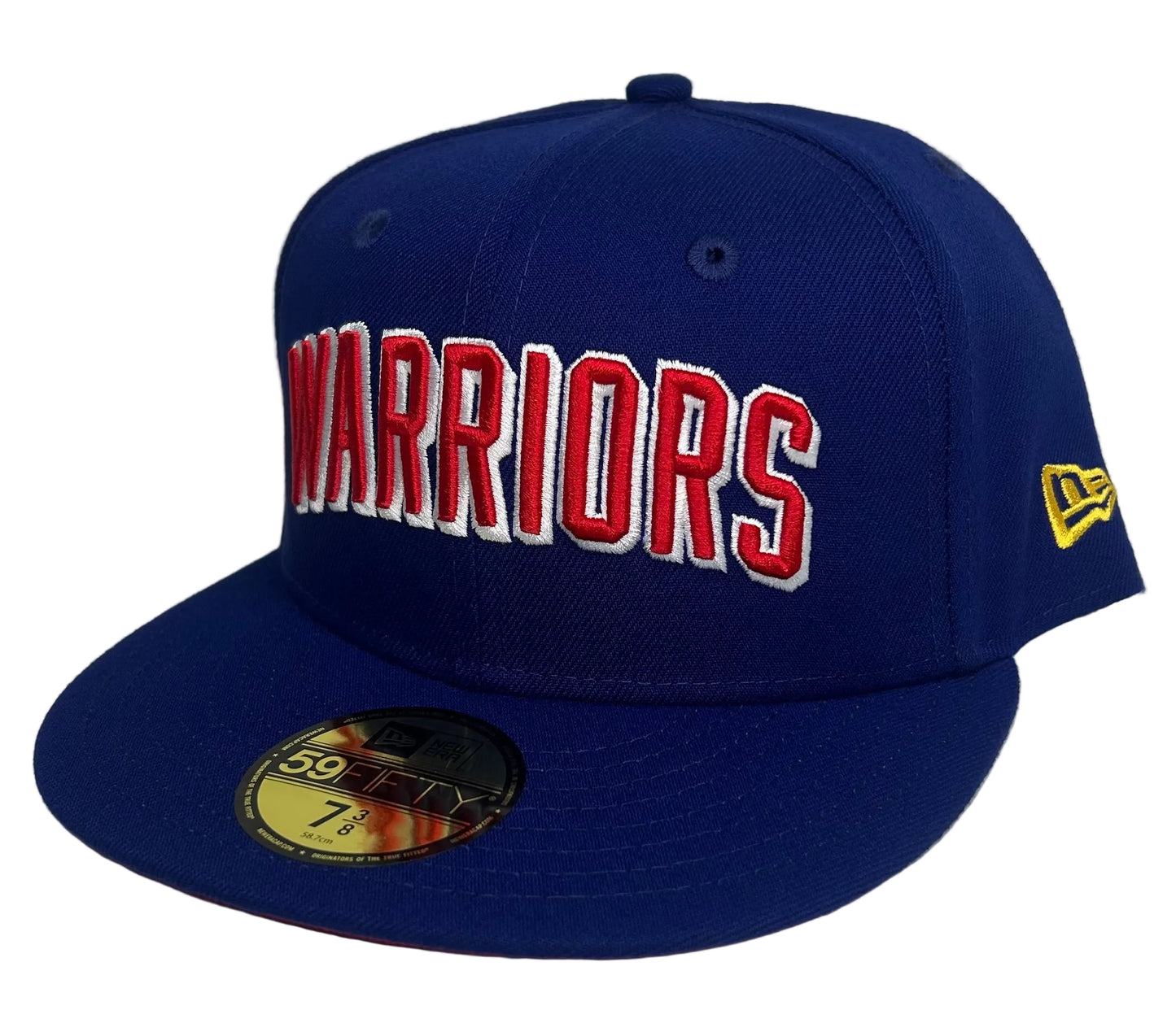 New Era 59FIFTY Golden State Warriors royal blue fitted cap featuring raised red and white "WARRIORS" block lettering across the front crown.