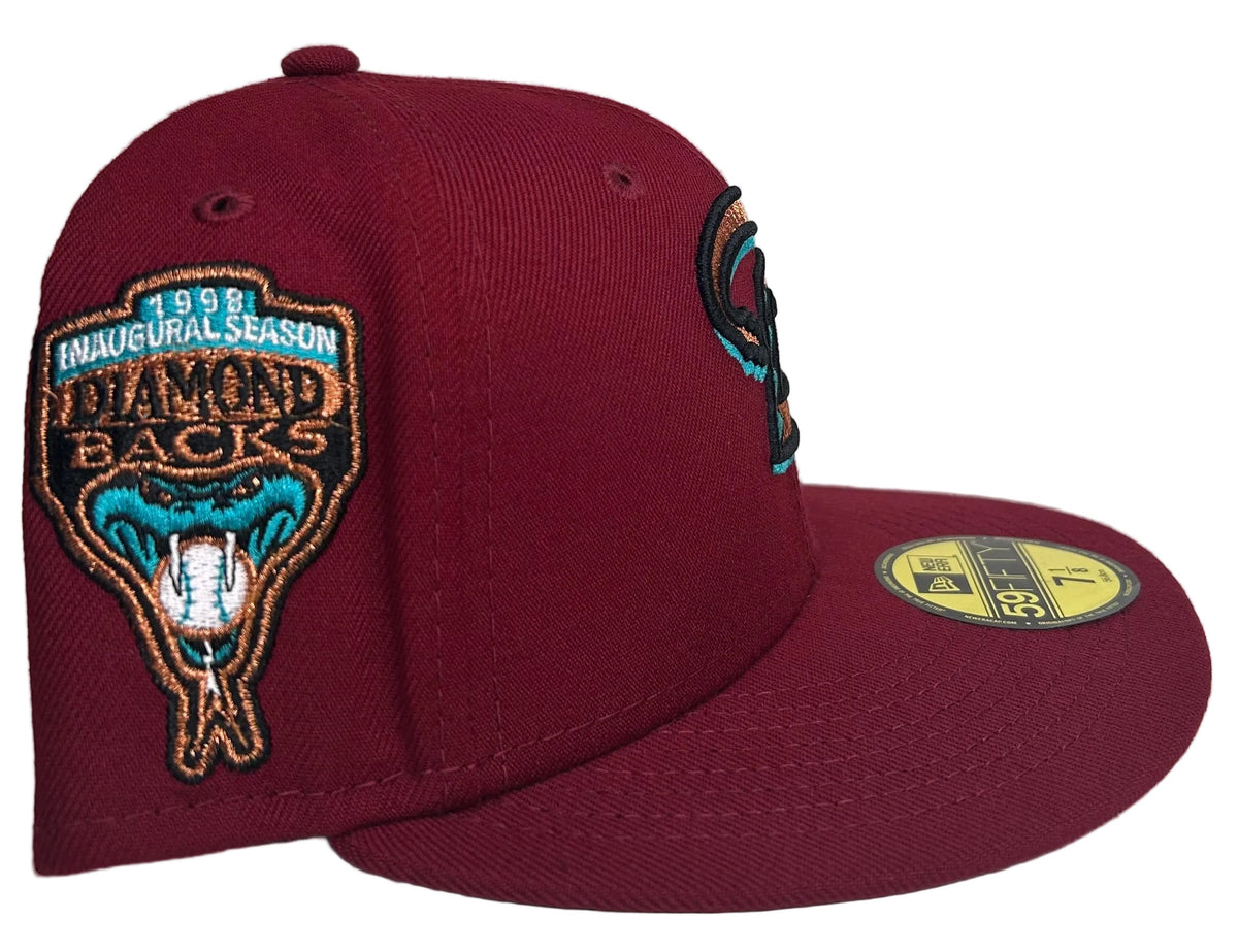 New Era 59FIFTY Arizona Diamondbacks fitted hat features a burgundy body and a 1998 inaugural season side patch.
