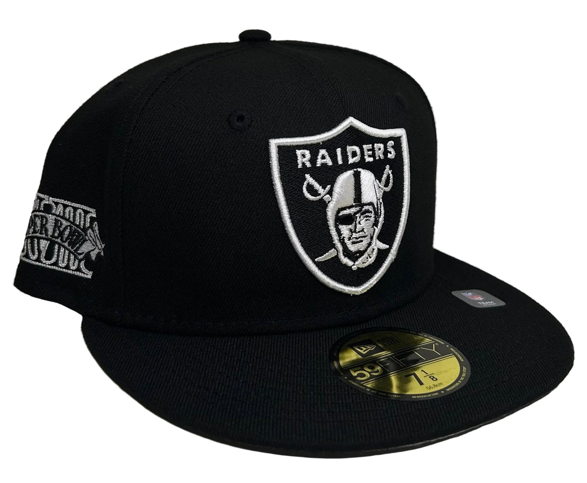New Era 59FIFTY Las Vegas Raiders Fitted Hat featuring a Super Bowl XVIII side patch, stylized in a sleek black and white embroidered design.