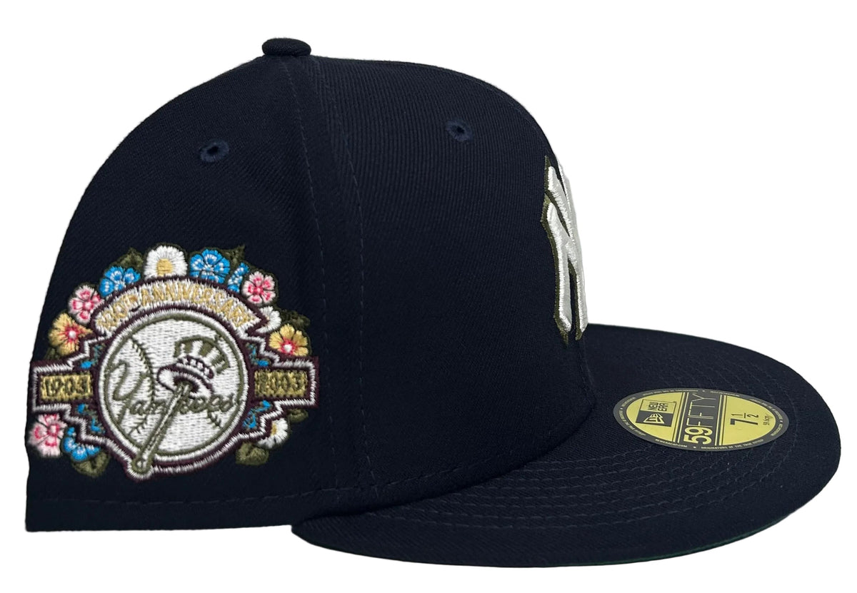 New York Yankees 100th Anniversary Spring Training Botanical 59FIFTY Fitted Hat featuring an embroidered white and green-trimmed team logo on the front and a colorful floral side patch.