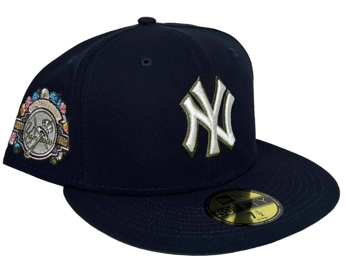 New York Yankees 100th Anniversary Spring Training Botanical 59FIFTY Fitted Hat featuring an embroidered white and green-trimmed team logo on the front and a colorful floral side patch.