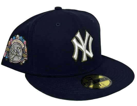 New York Yankees 100th Anniversary Spring Training Botanical 59FIFTY Fitted Hat featuring an embroidered white and green-trimmed team logo on the front and a colorful floral side patch.