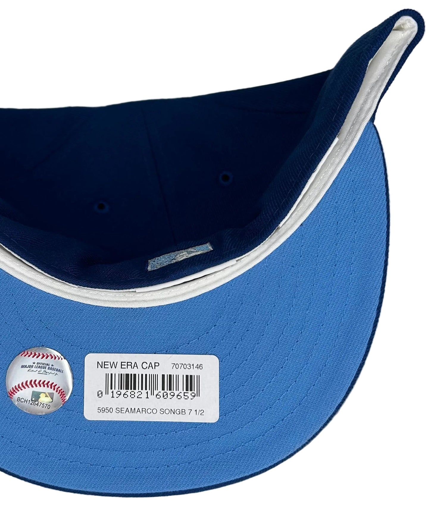 New Era Seattle Mariners 59FIFTY fitted hat featuring a light blue compass star logo and a 40th-anniversary side patch.