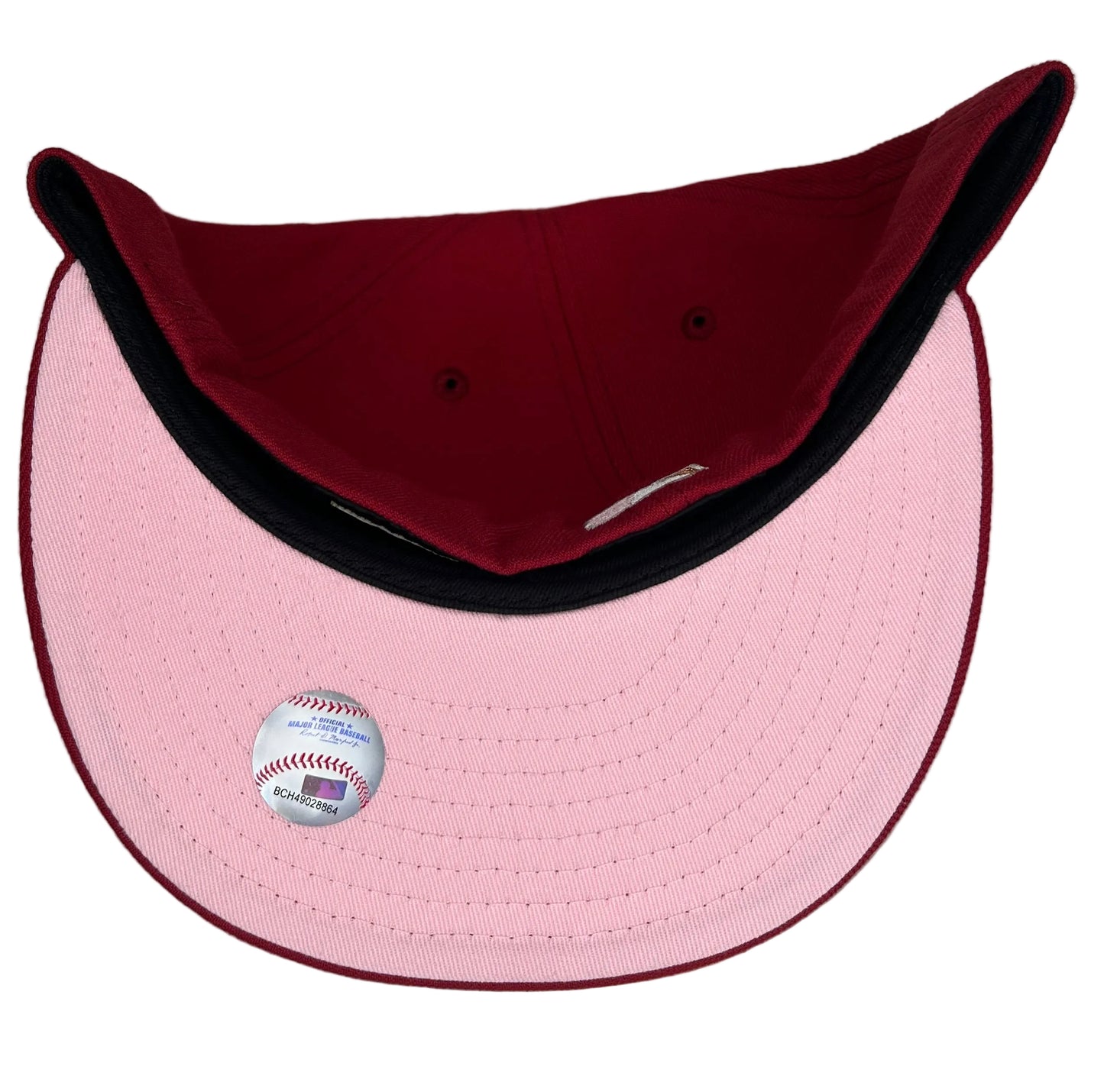 New Era 59FIFTY Minnesota Twins Fitted Hat styled in a distinct burgundy/cardinal red colorway.