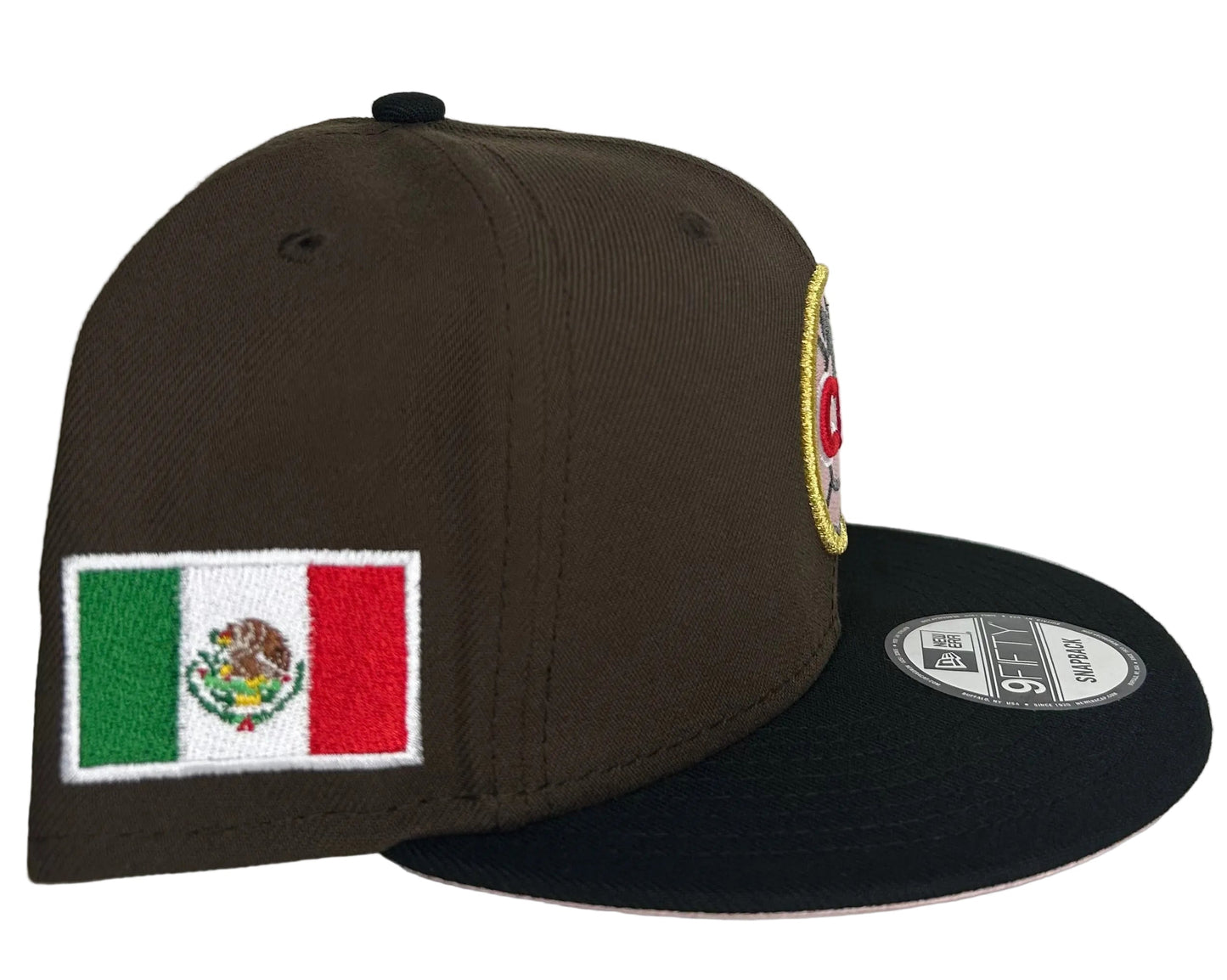 America New Era 9FIFTY snapback cap features a brown crown, black visor, and a Mexican flag patch on the side.