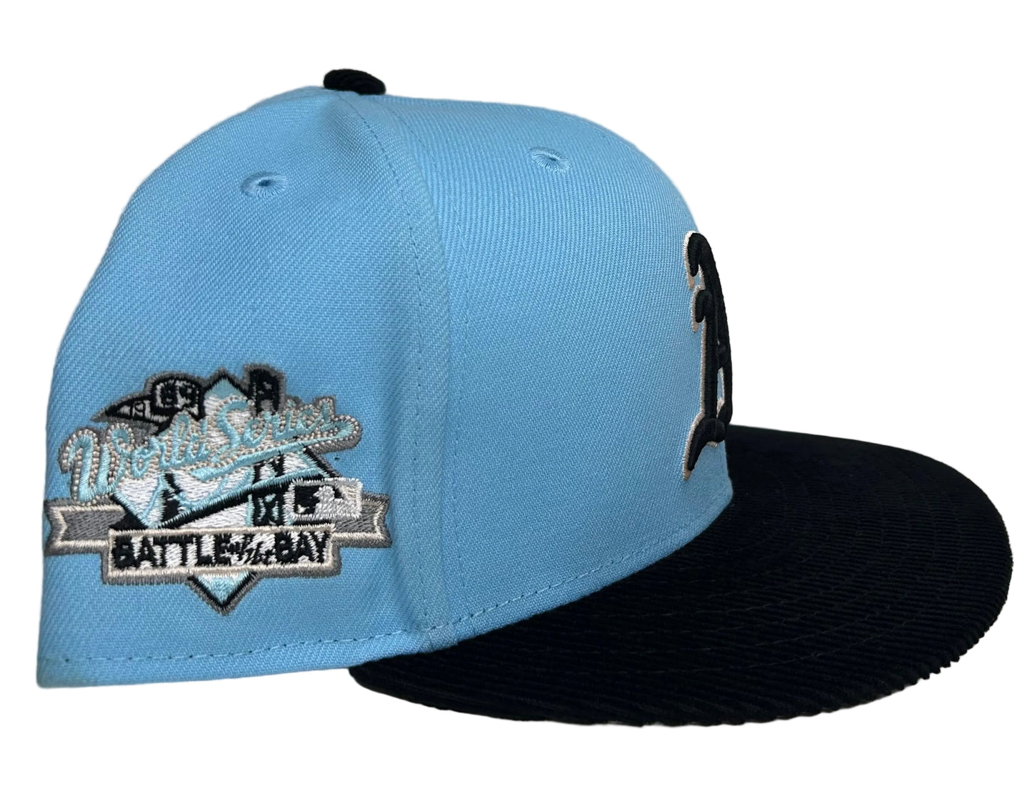 New Era 59FIFTY Oakland Athletics fitted hat featuring a light blue crown, black corduroy visor, and a 1989 World Series patch.