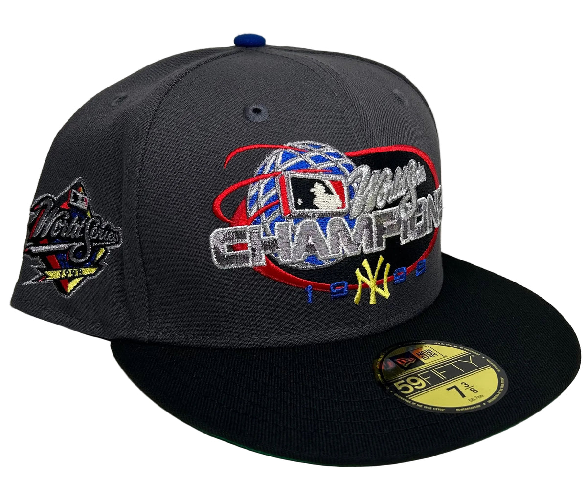 New Era New York Yankees 1998 World Series Champions 59FIFTY fitted hatfeaturing a large embroidered "Champions 1998" globe graphic on the front.