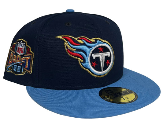 New Era Tennessee Titans 59FIFTY fitted hat in a two-tone navy and light blue design featuring a side patch.