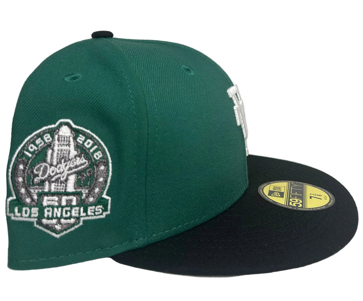 New Era Los Angeles Dodgers 59FIFTY fitted cap featuring a green crown, black visor, and an upside-down white logo.