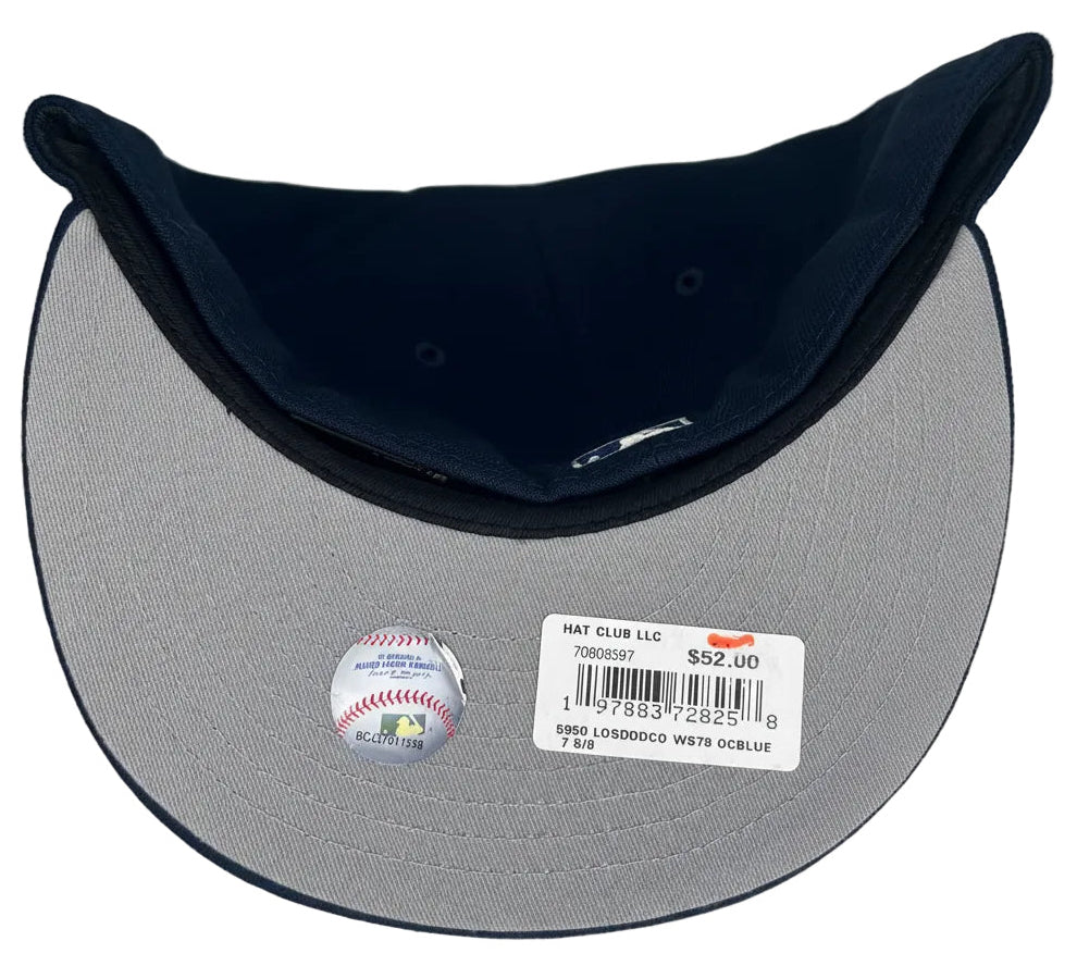 New Era 59FIFTY Los Angeles Dodgers fitted cap in navy blue with a 75th World Series side patch.
