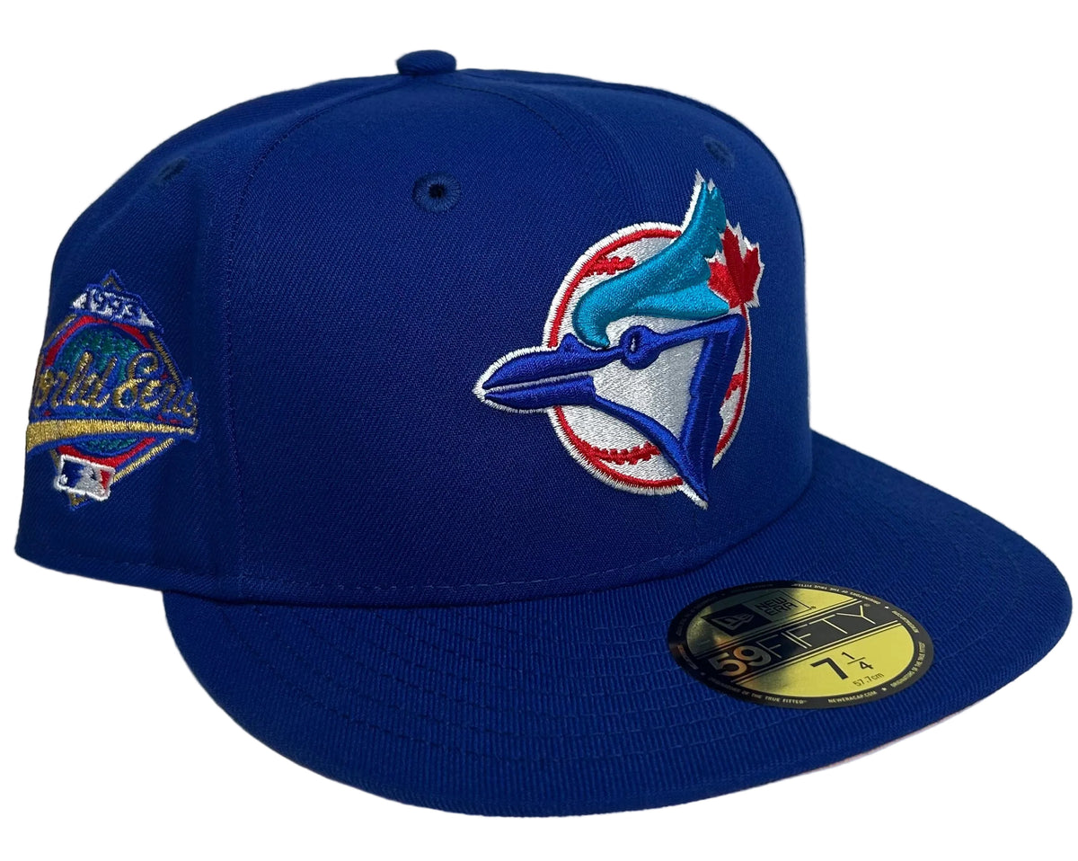 New Era Toronto Blue Jays 1993 World Series 59FIFTY Fitted Hat featuring the team's iconic embroidered blue jay logo on the front & Pink UV.