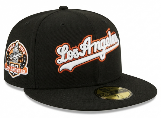New Era 59FIFTY Los Angeles Dodgers fitted hat featuring a script logo and a celebratory side patch.