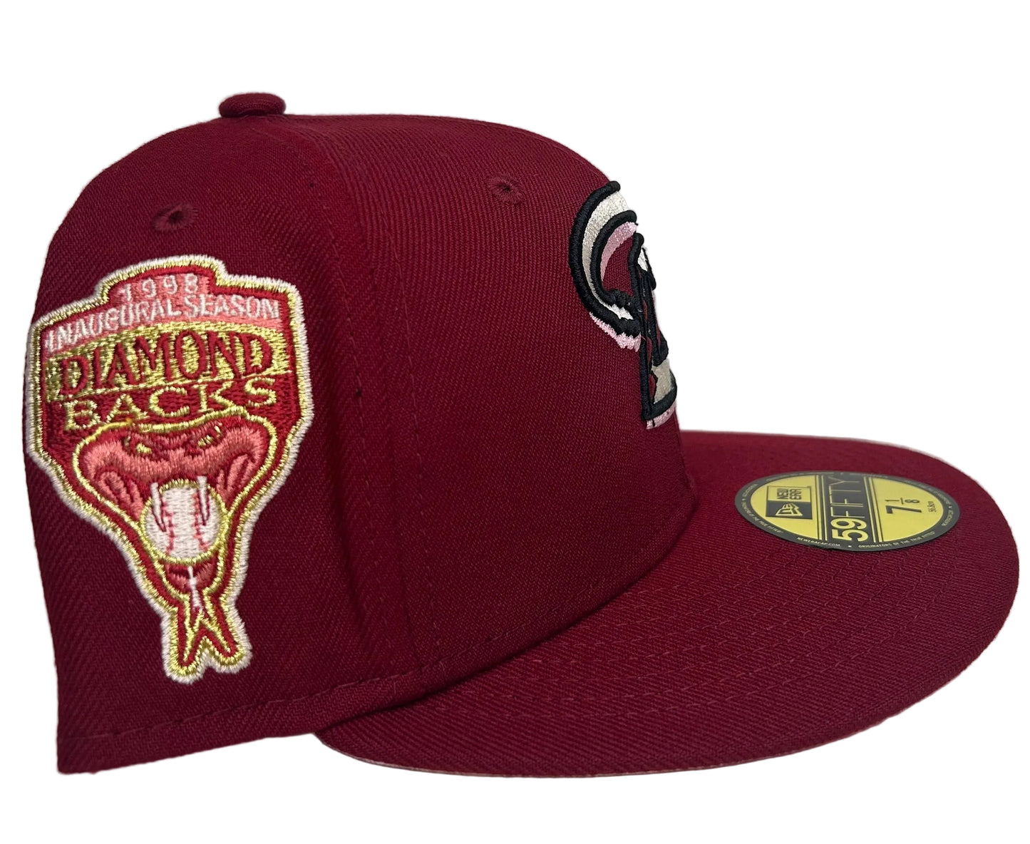 New Era Arizona Diamondbacks 59FIFTY fitted hat features a maroon crown and a prominent inaugural season side patch.