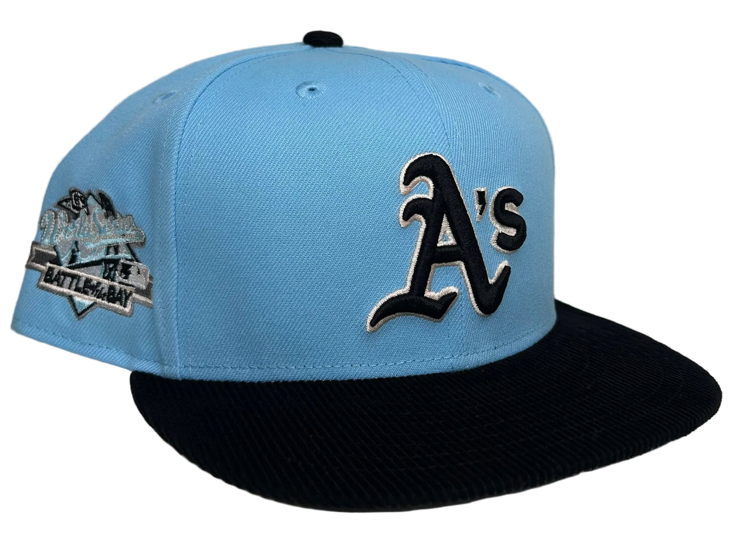 New Era 59FIFTY Oakland Athletics fitted hat featuring a light blue crown, black corduroy visor, and a 1989 World Series patch.