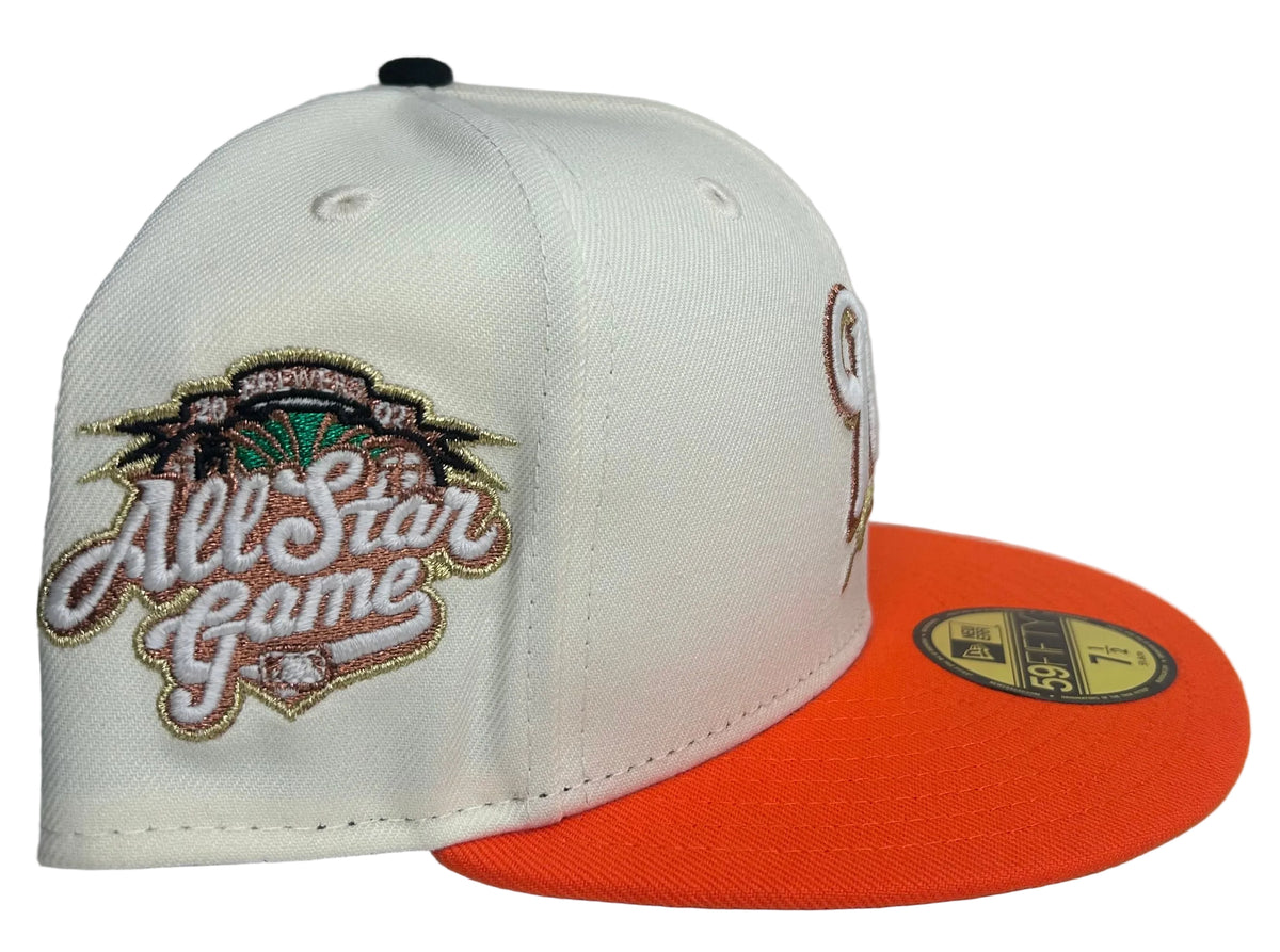 New Era Milwaukee Brewers 2002 All Star Game 59Fifty fitted hat features a cream crown, orange visor, and a commemorative side patch.
