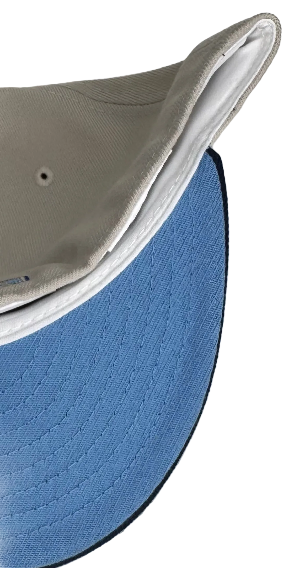 New Era 59FIFTY fitted hat features a white crown and blue visor with a Los Angeles Angels wing logo embroidered in blue tones.