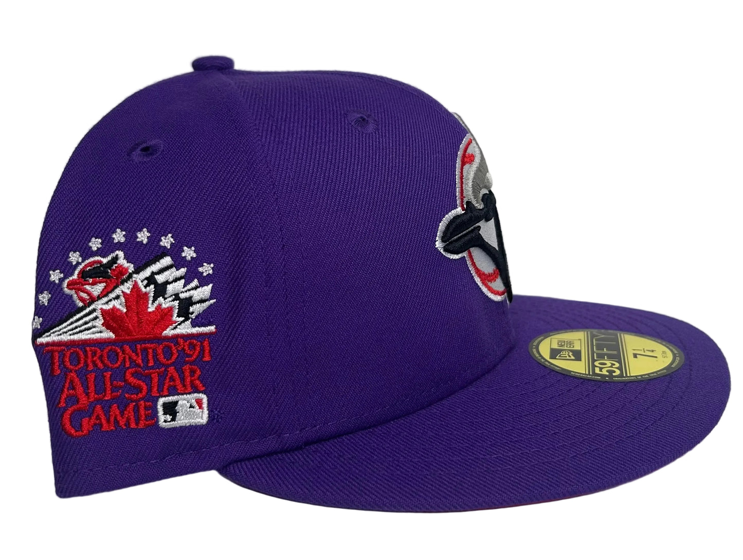New Era 59Fifty Toronto Blue Jays fitted hat features a distinct purple crown and a red under-visor, accented by a 1991 All-Star Game side patch.