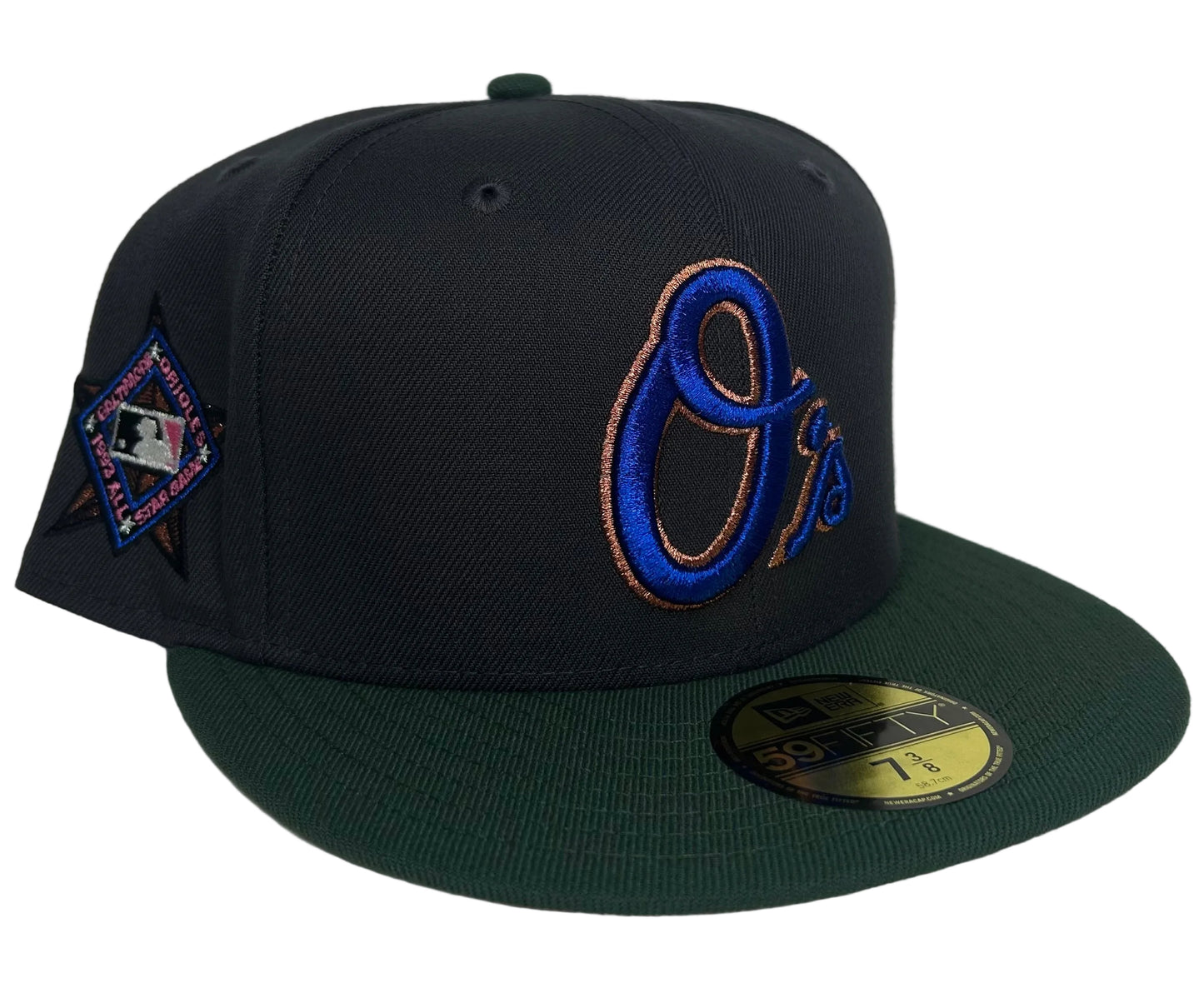 New Era Hatstore Exclusive x Baltimore Orioles 59FIFTY fitted hat featuring a metallic blue and copper logo.