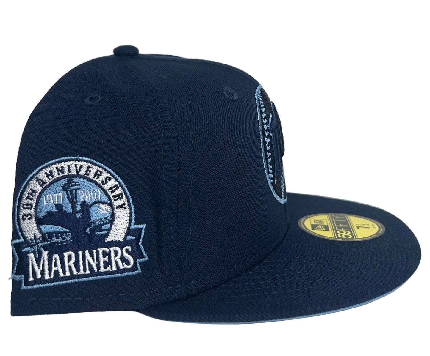 New Era 59Fifty Seattle Mariners "Chasing M's" fitted hat features an ocean blue crown and a light blue undervisor.
