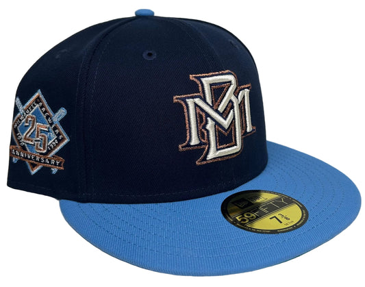 HC Exclusive Beer Pack Milwaukee Brewers 25th Anniversary Patch 59Fifty Fitted Hat in navy and light blue with an embroidered interlocking "M" logo on the front.
