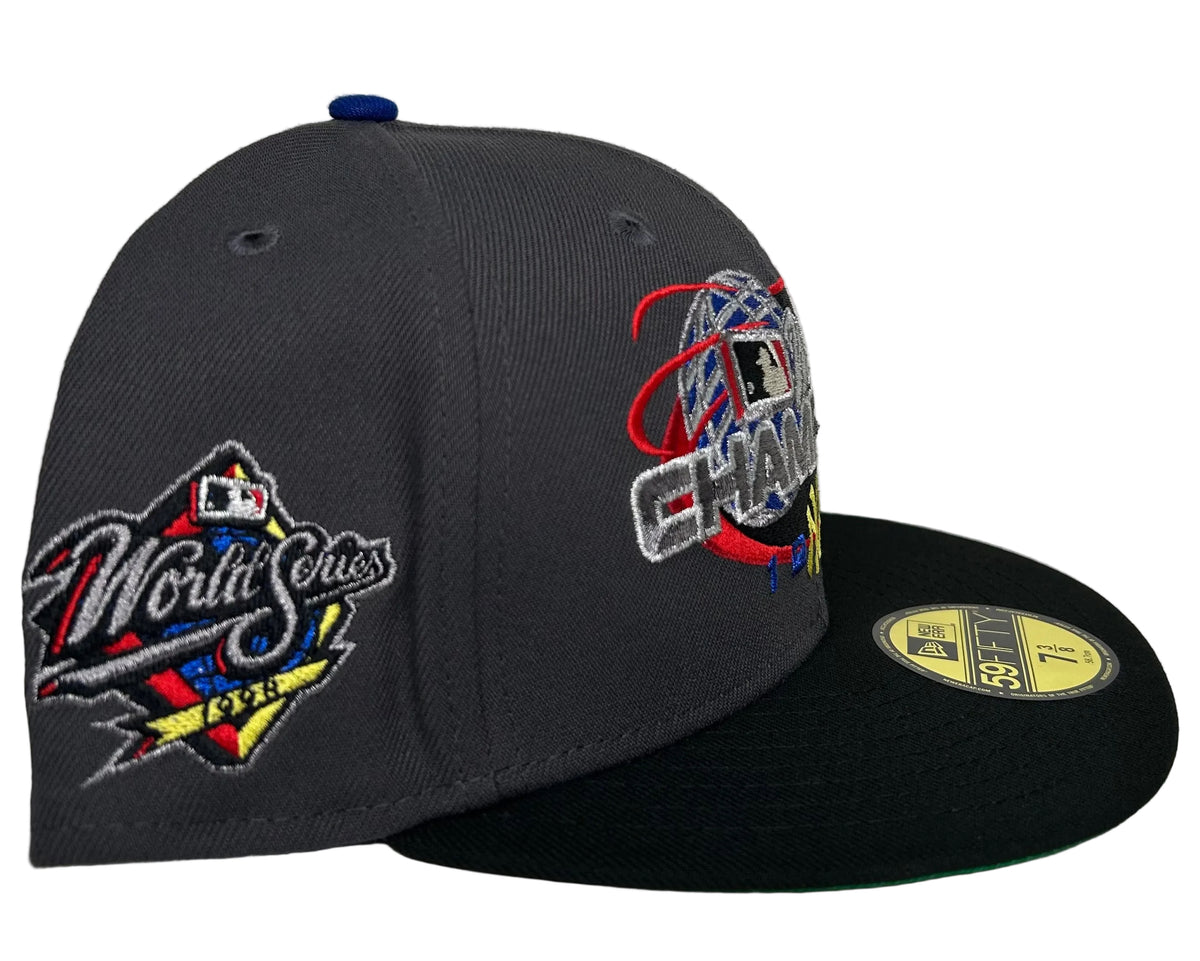 New Era New York Yankees 1998 World Series Champions 59FIFTY fitted hatfeaturing a large embroidered "Champions 1998" globe graphic on the front.