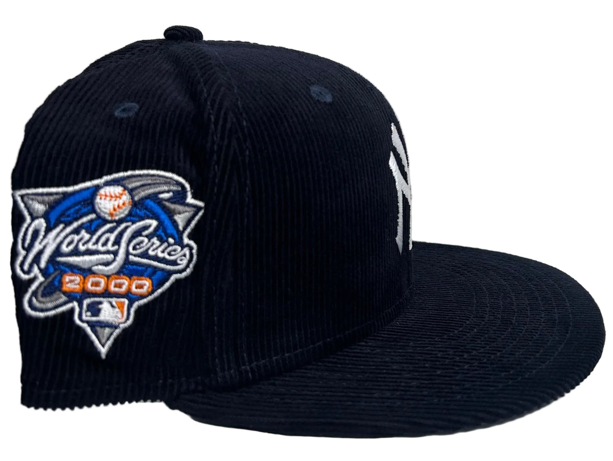 New Era New York Yankees Throwback Corduroy 59FIFTY Fitted Hat in navy blue featuring a 2000 World Series side patch.