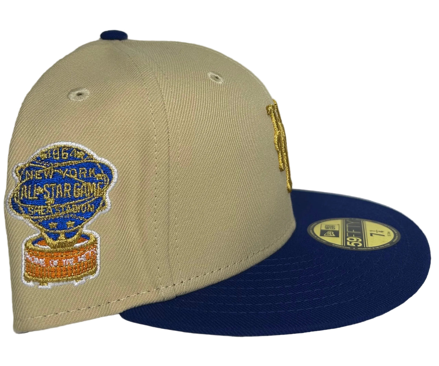 New Era New York Mets 59FIFTY fitted hat in a stone/vegas gold and navy blue colorway with a side patch, with an 1964 All-Star Game Patch.