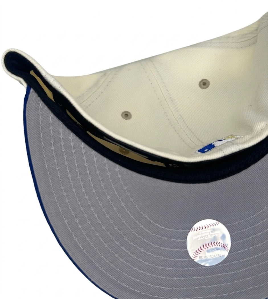 New Era 59Fifty Los Angeles Dodgers cap features a cream-colored crown with a royal blue visor.