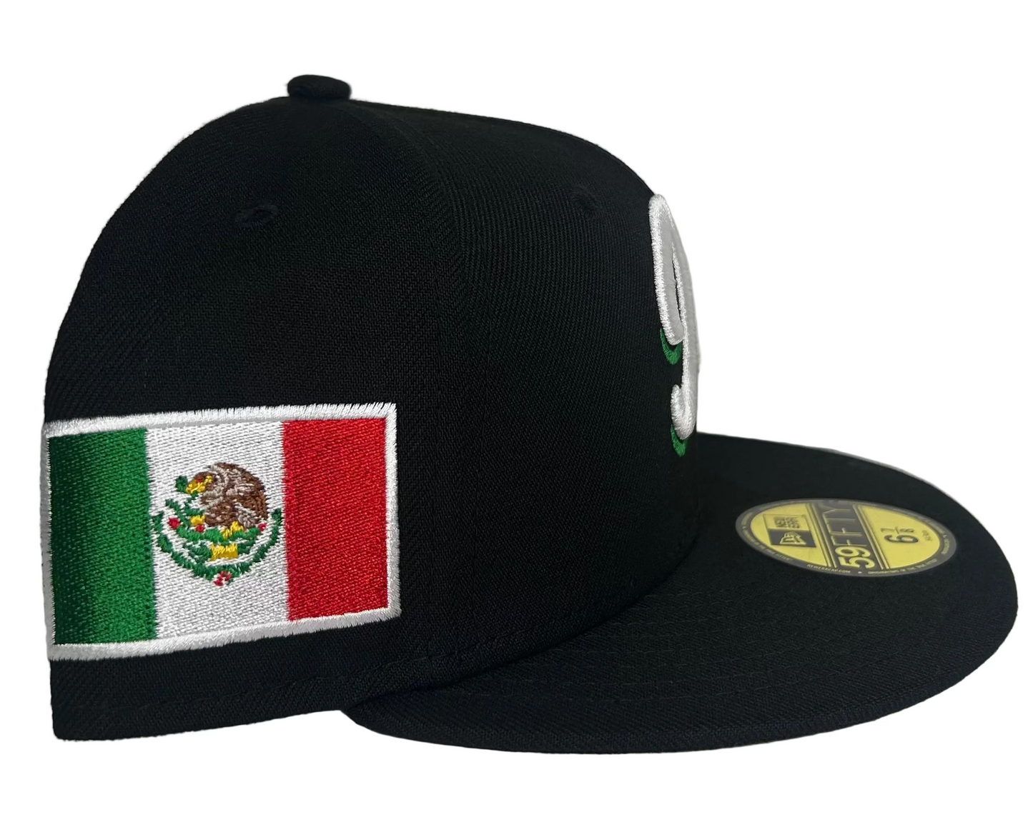 New Era Mexico Serie Del Caribe 59FIFTY fitted cap features a black design with a white embroidered "M" logo and a Mexican flag patch on the side.