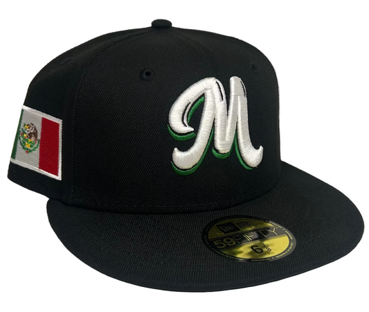 New Era Mexico Serie Del Caribe 59FIFTY fitted cap features a black design with a white embroidered "M" logo and a Mexican flag patch on the side.