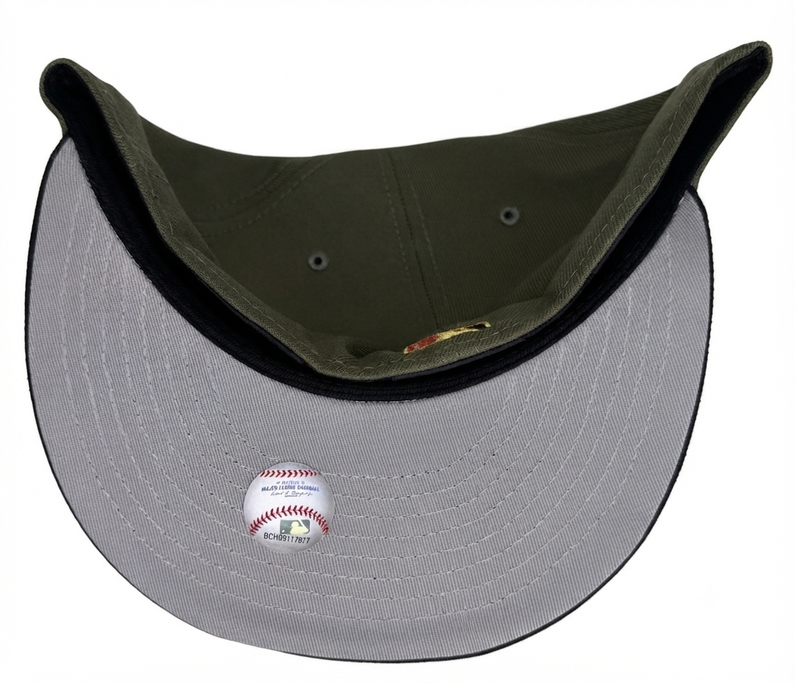 New Era Houston Astros 59FIFTY fitted hat featuring a distinct olive canvas crown and a black brim.