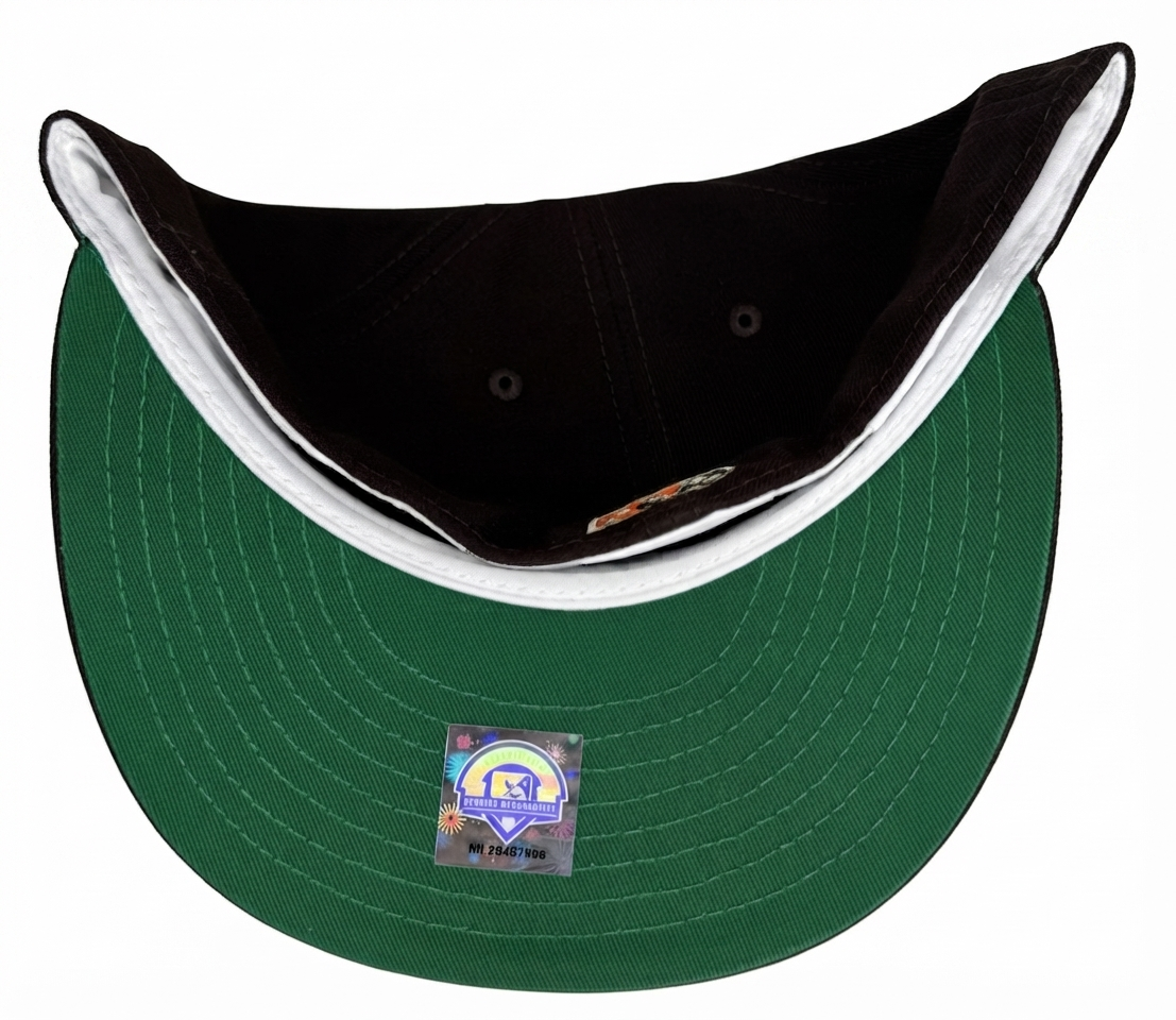 New Era Fresno Grizzlies fitted hat featuring a scratch-effect team logo and a green underbrim.