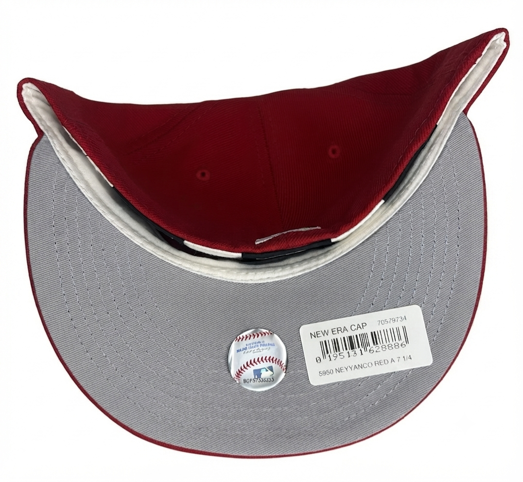 New Era New York Yankees 59Fifty Fitted Hat featuring a unique red "Big Apple" & a Yankees Stadium SP.