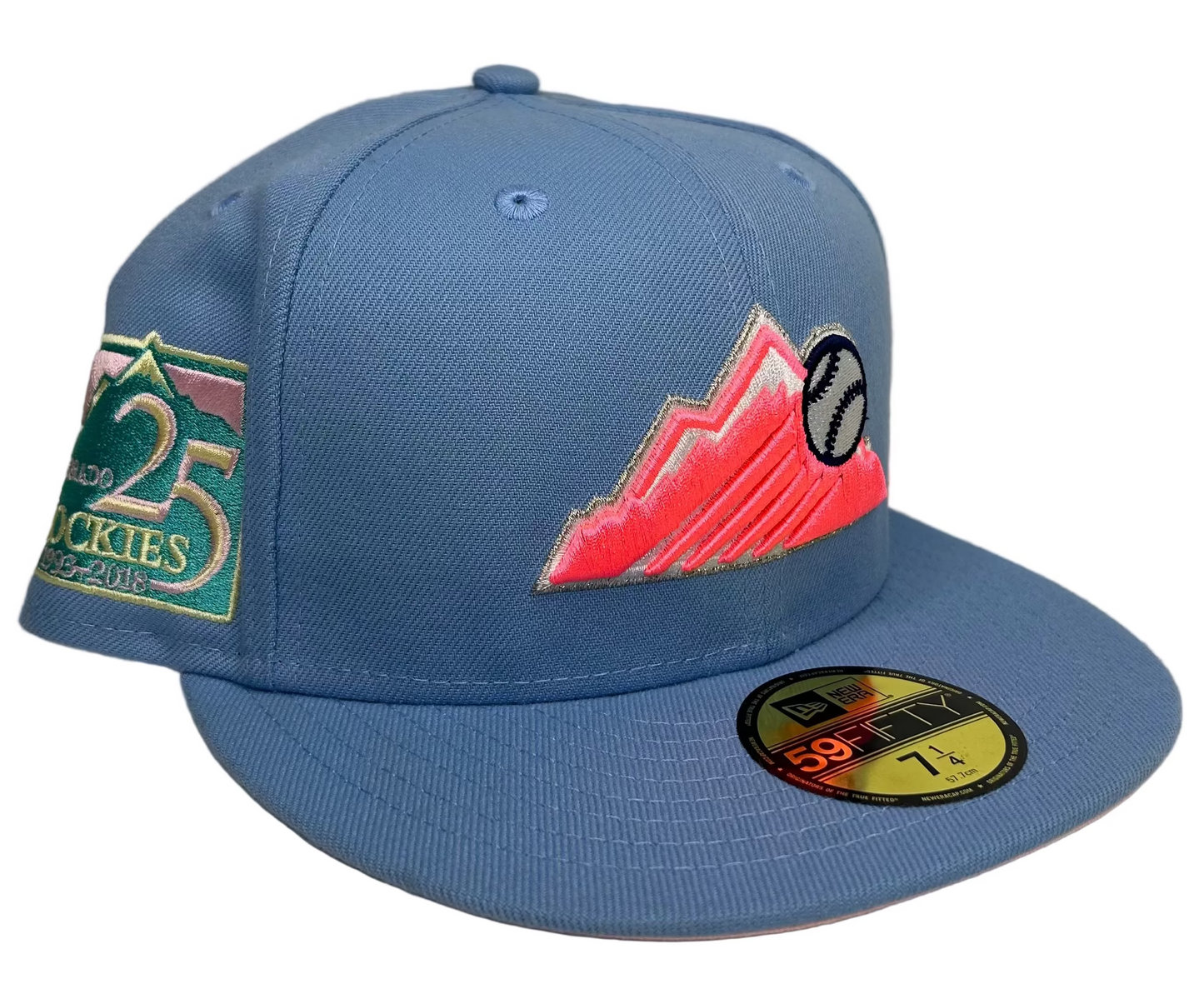 New Era Colorado Rockies "Cotton Candy" 59FIFTY fitted hat features a sky blue crown, a vibrant pink mountain logo on the front, and a special 25th-anniversary patch.