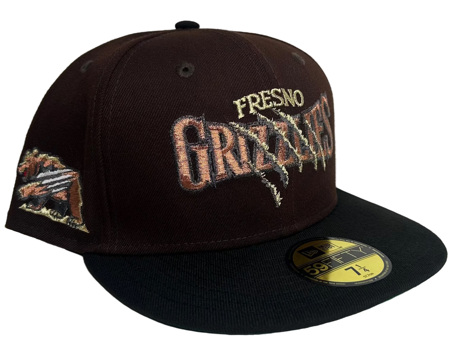 New Era Fresno Grizzlies 59Fifty fitted hat features a brown crown with a "clawed" logo and a contrasting black brim.