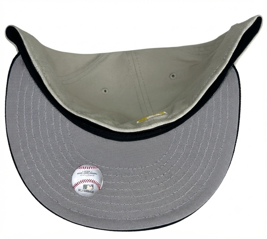 New Era Los Angeles Dodgers 50th Anniversary Stone Two-Tone Edition 59Fifty fitted hat featuring a gold embroidered logo.