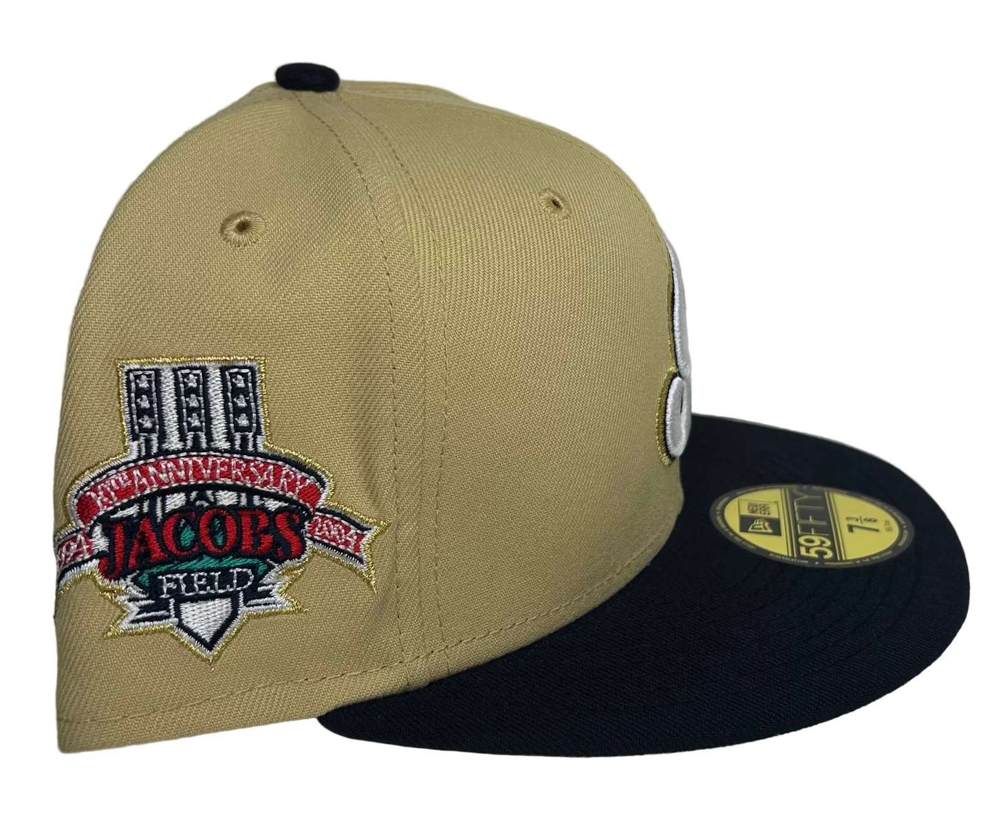 New Era Cleveland Indians 10th Anniversary Jacobs Field Vegas Two Tone Edition 59Fifty Fitted Cap features a striking metallic gold embroidered script logo.