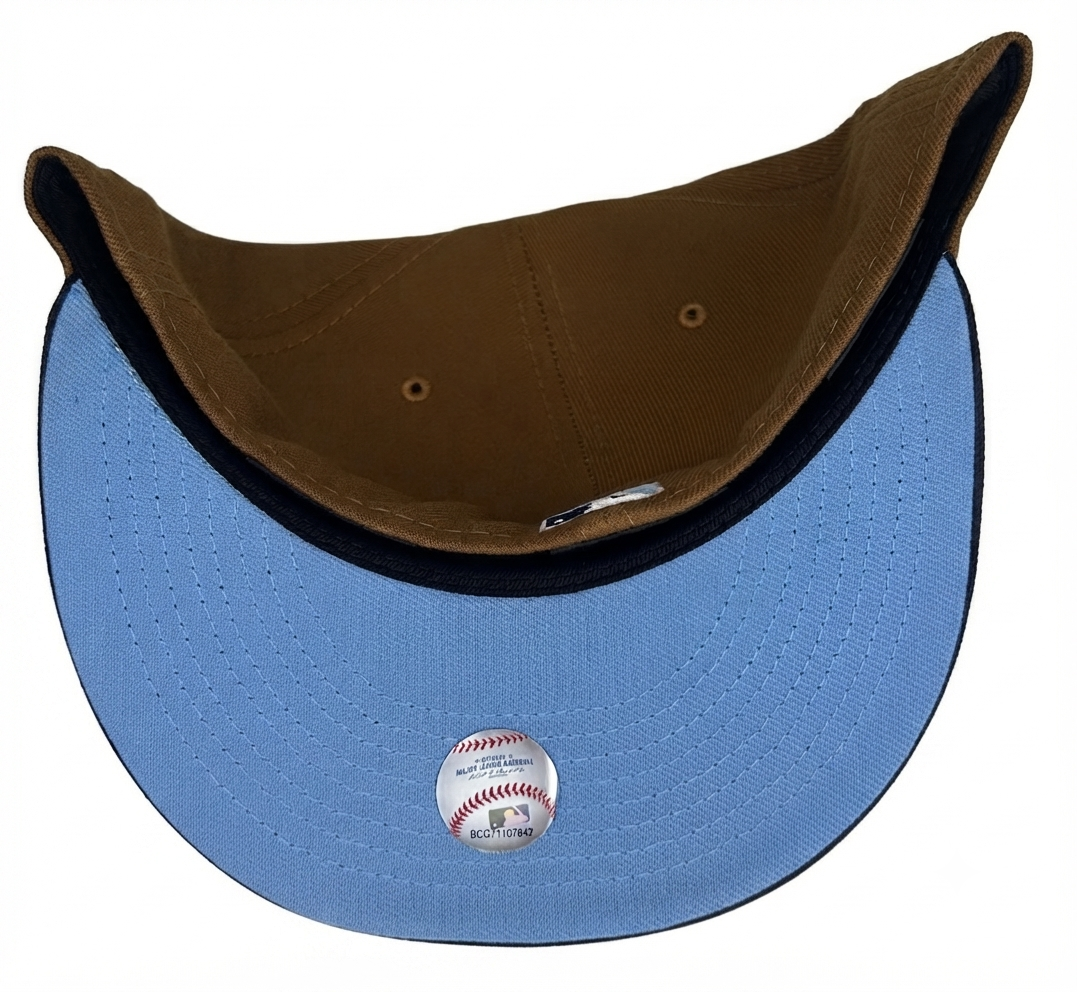 New Era Atlanta Braves 59FIFTY fitted hat features a brown crown and navy blue visor & Icy UV  with a 2000 ASG side patch.
