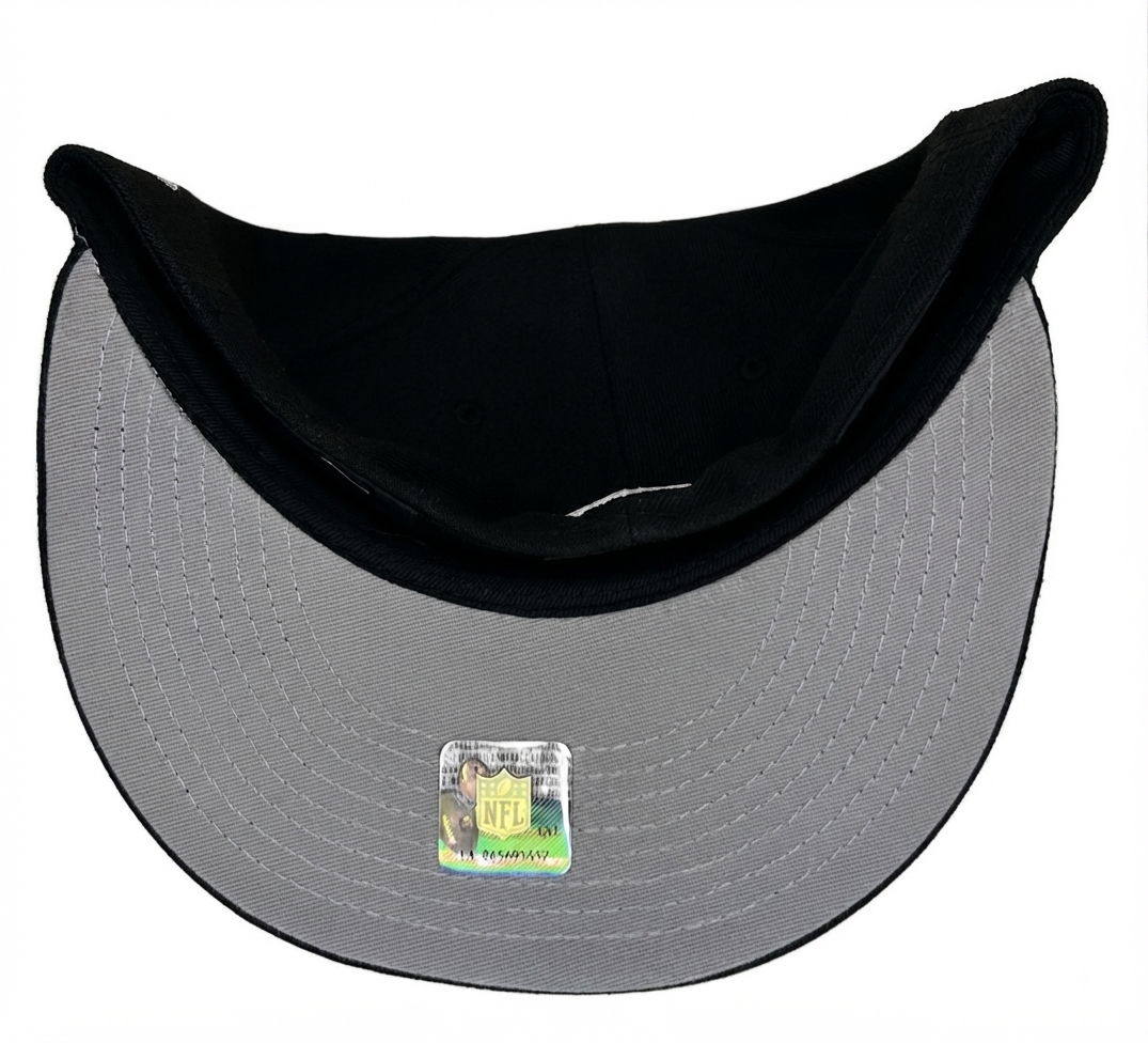 New Era 59FIFTY Las Vegas Raiders Fitted Hat featuring a Super Bowl XVIII side patch, stylized in a sleek black and white embroidered design.