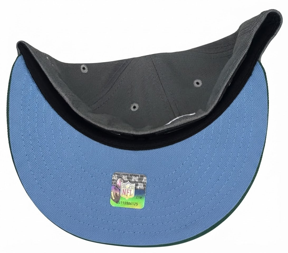Gray & Green New Era 59FIFTY Las Vegas Raiders fitted Hat features a prominent team shield logo on the front and a Super Bowl side patch.