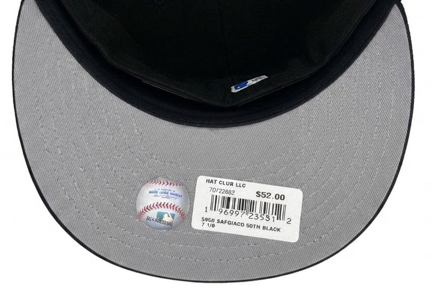 New Era San Francisco Giants 59FIFTY fitted hat in black with a striking yellow embroidered team logo and a commemorative side patch.