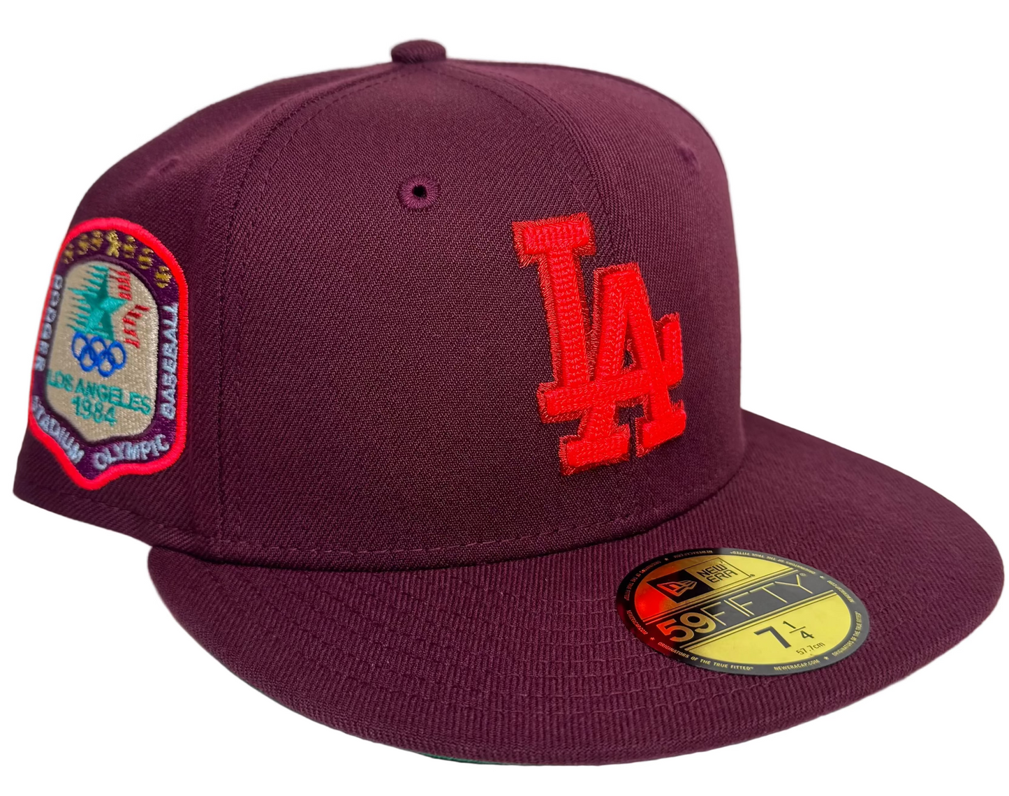 Maroon Los Angeles Dodgers 59FIFTY fitted hat from New Era's "Color Fam Lava" collection, featuring a vibrant red team logo and a commemorative 1984 Los Angeles Olympic side patch.