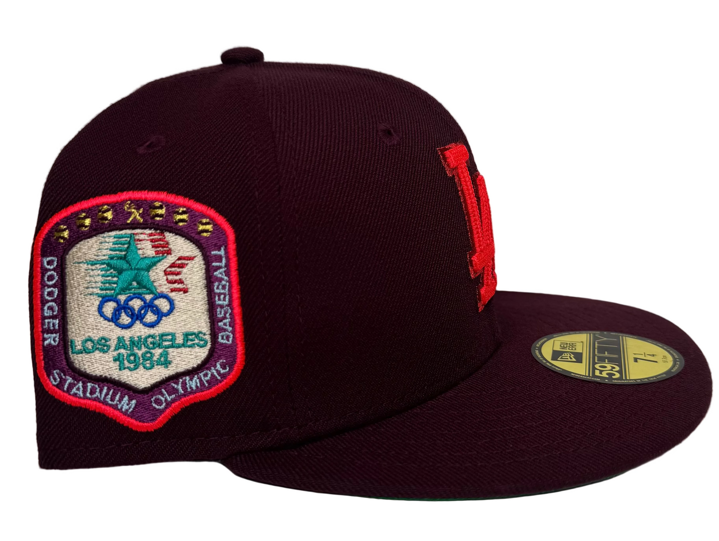 Maroon Los Angeles Dodgers 59FIFTY fitted hat from New Era's "Color Fam Lava" collection, featuring a vibrant red team logo and a commemorative 1984 Los Angeles Olympic side patch.