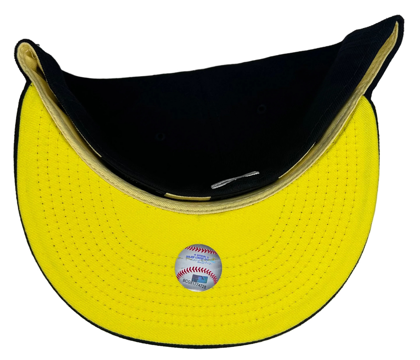 New Era New York Yankees 59FIFTY fitted hat featuring a vibrant green and yellow 1996 World Series side patch.