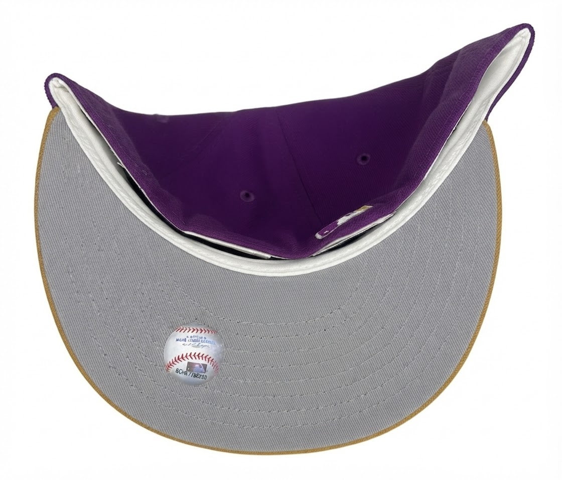 New Era New York Yankees Grape Purple 59FIFTY fitted hat featuring a tan/camel brim and a 2000 Subway Series side patch.