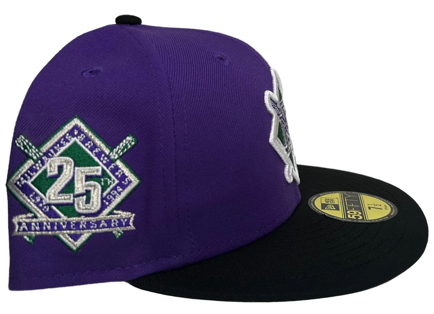 New Era 59FIFTY NBA Crossover Milwaukee Brewers/Bucks fitted hat featuring a purple crown and a green-and-white Milwaukee Bucks crossover logo on the front.